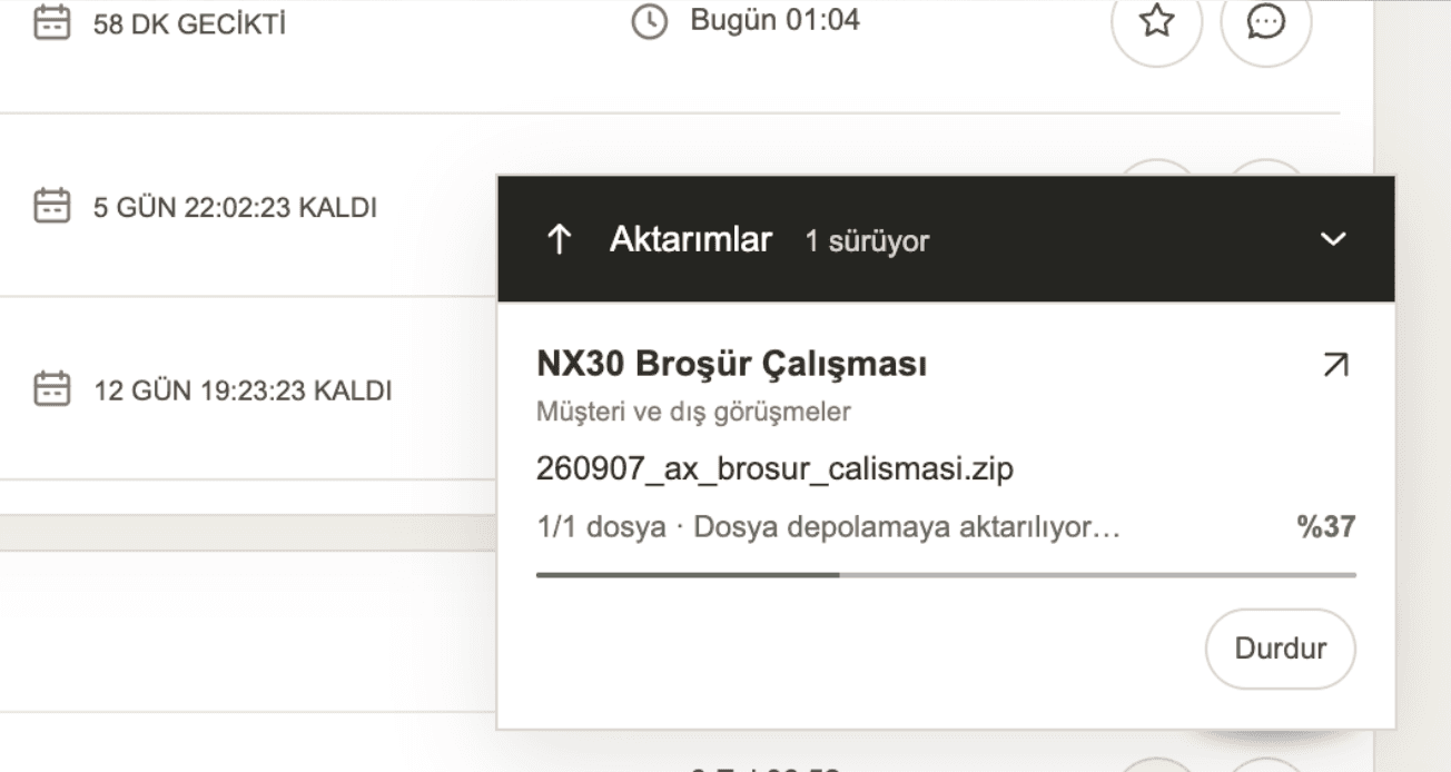 Örnek aktarım kutusu: NX30 Broşür Çalışması dosyasının yüklenme ilerlemesi yüzde 37